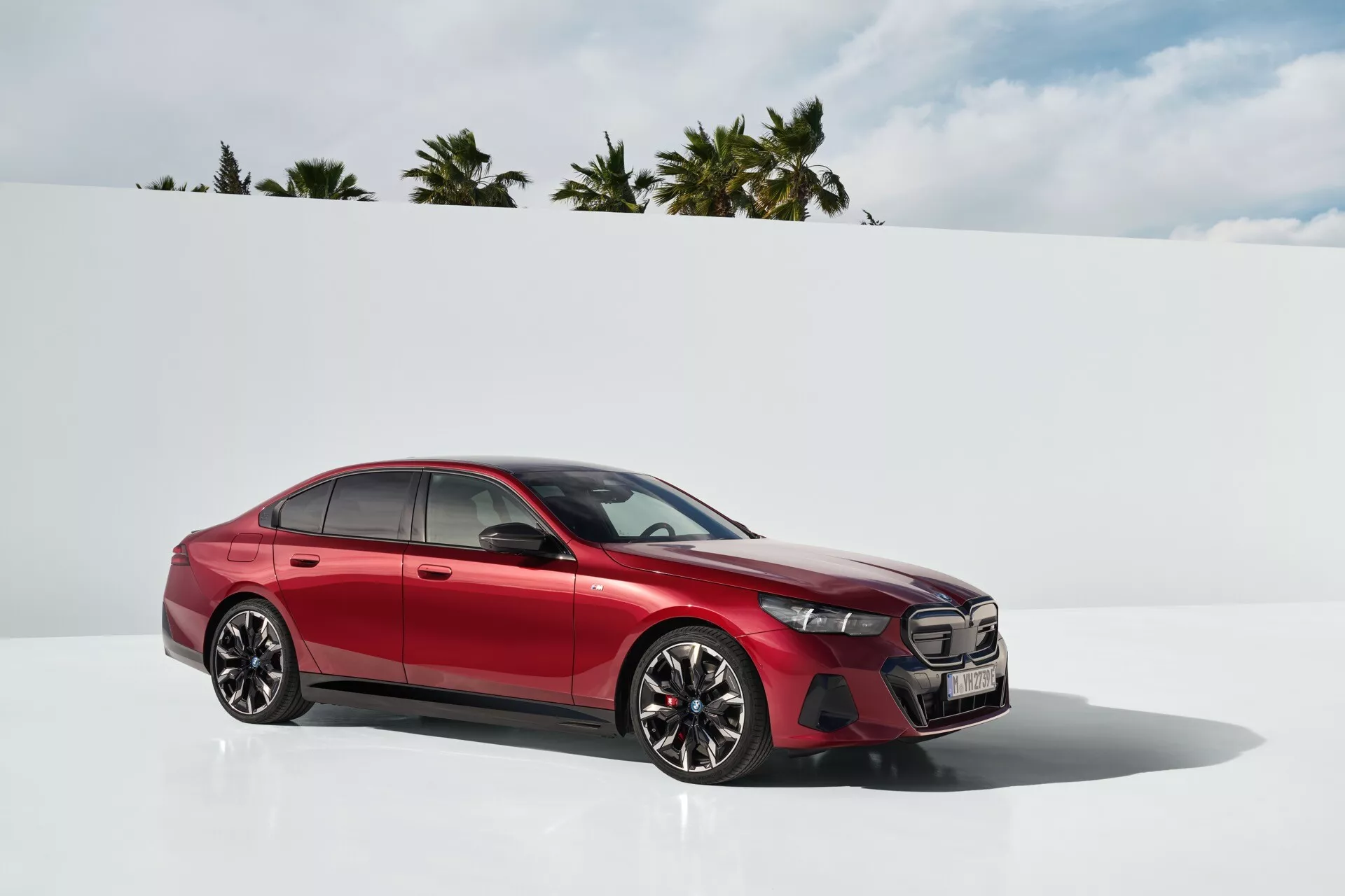 2023 BMW 5 Series (G60-G61) showcasing its sleek design, advanced technology features, and powerful performance in a modern urban environment