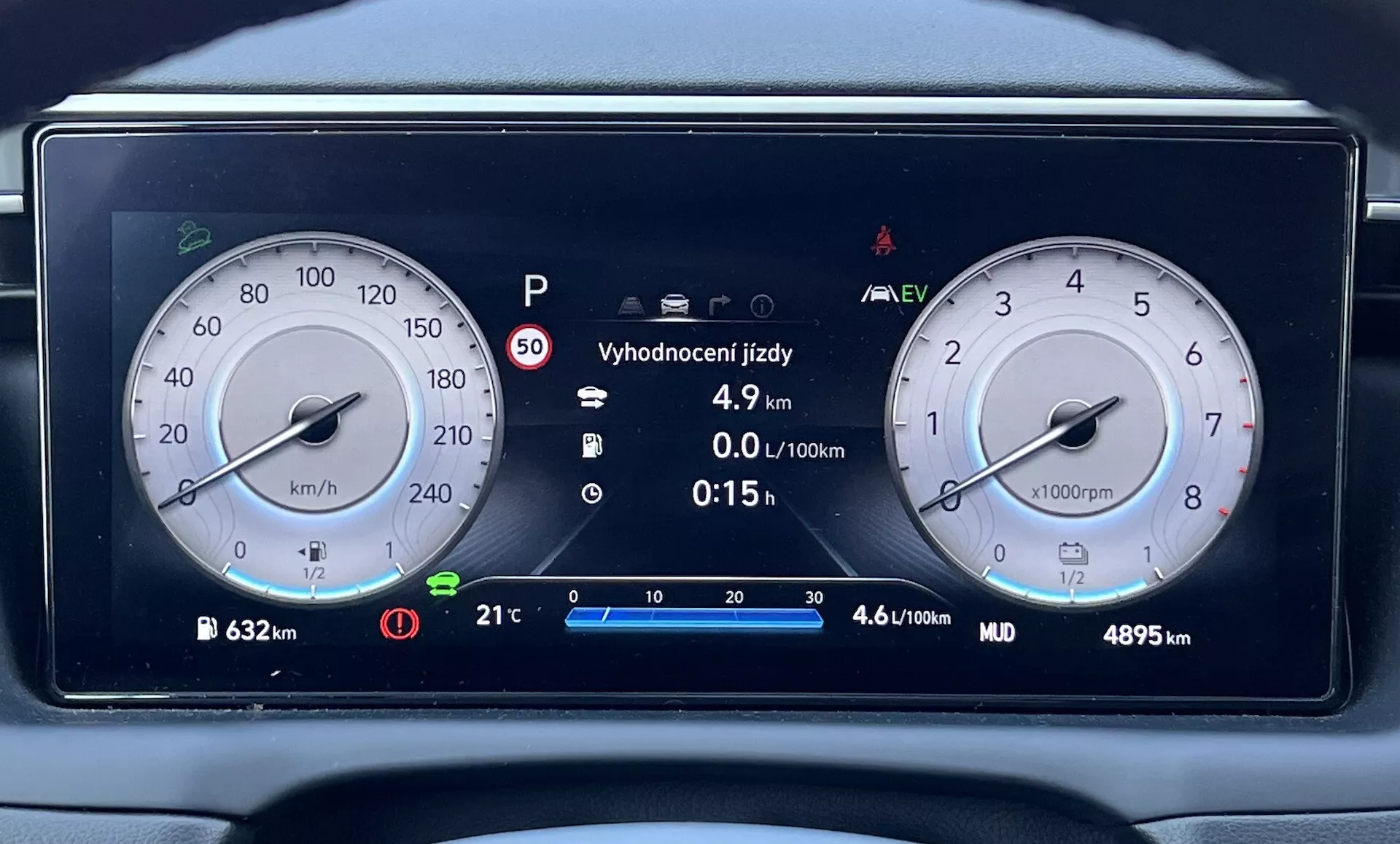 2020 Hyundai Tucson digital instrument cluster featuring speedometer, tachometer, hybrid technology indicator, and detailed vehicle information on a modern dashboard