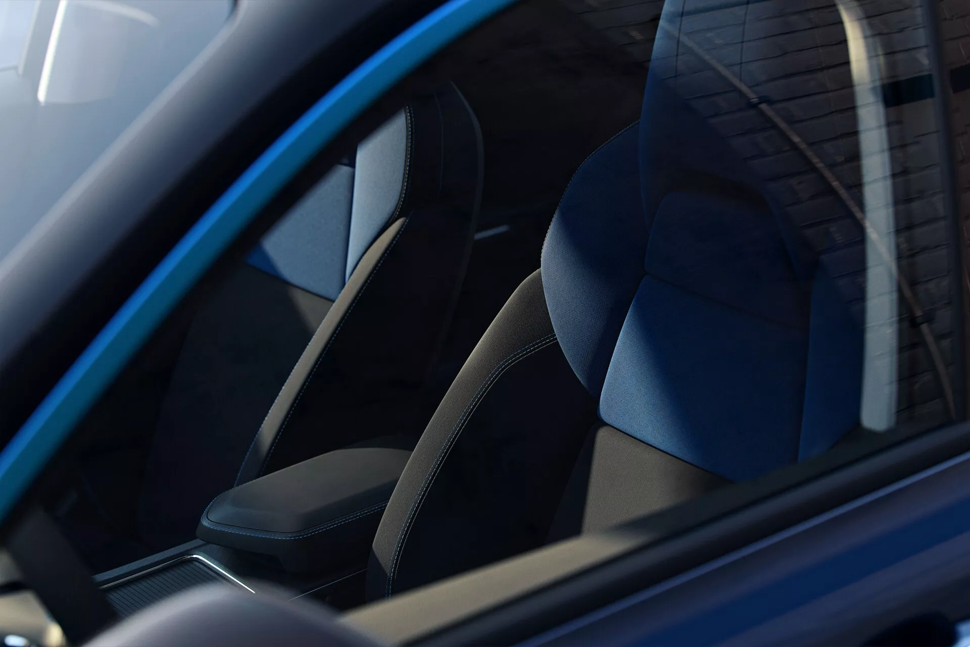 Detailed view of Lynk & Co 01 2021 (1st Generation) driver's seat featuring dual-tone upholstery and ergonomic design, as seen through the side window