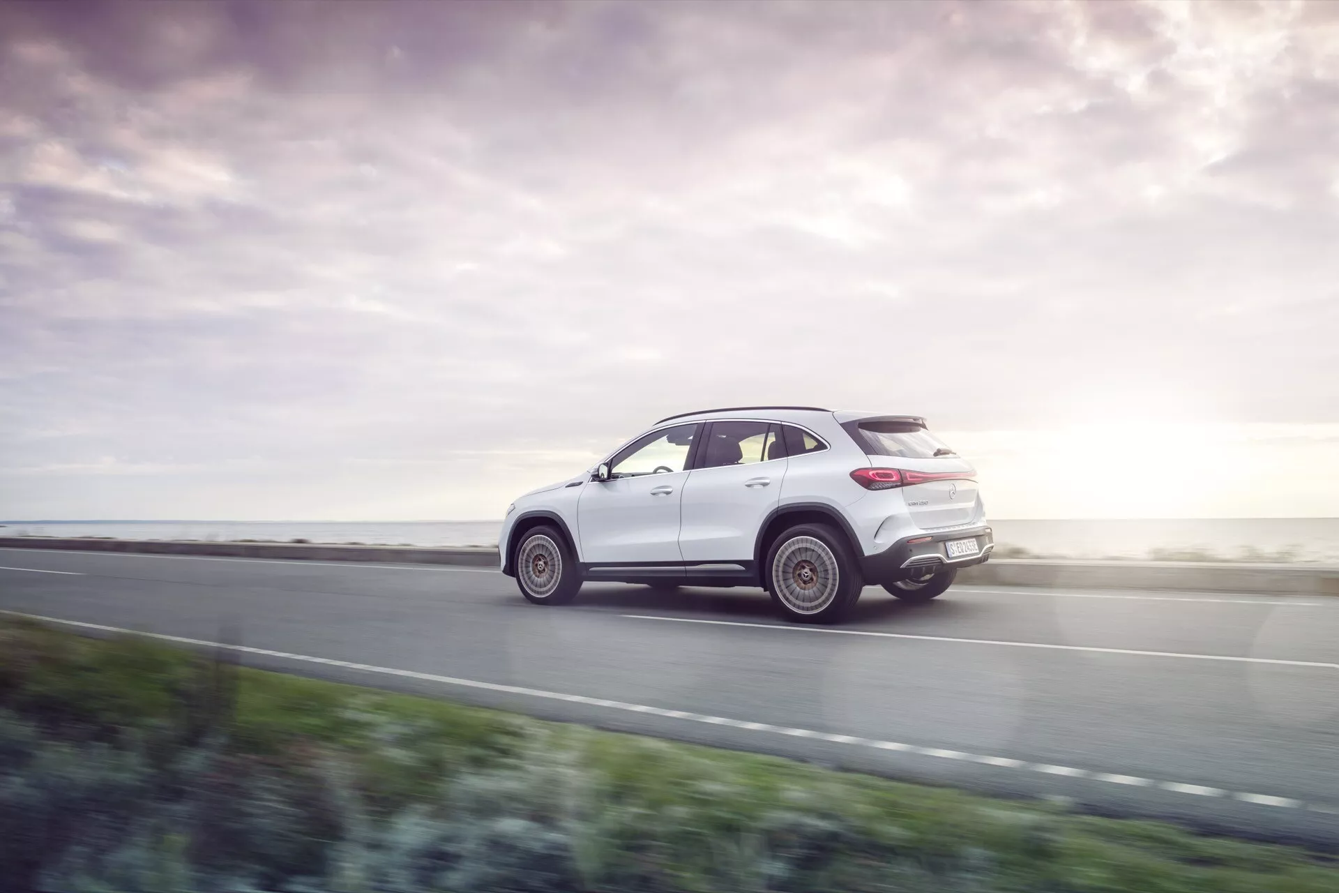 Frontal view of the Mercedes-Benz EQA 2021 model 243 featuring sleek headlights and electric grille