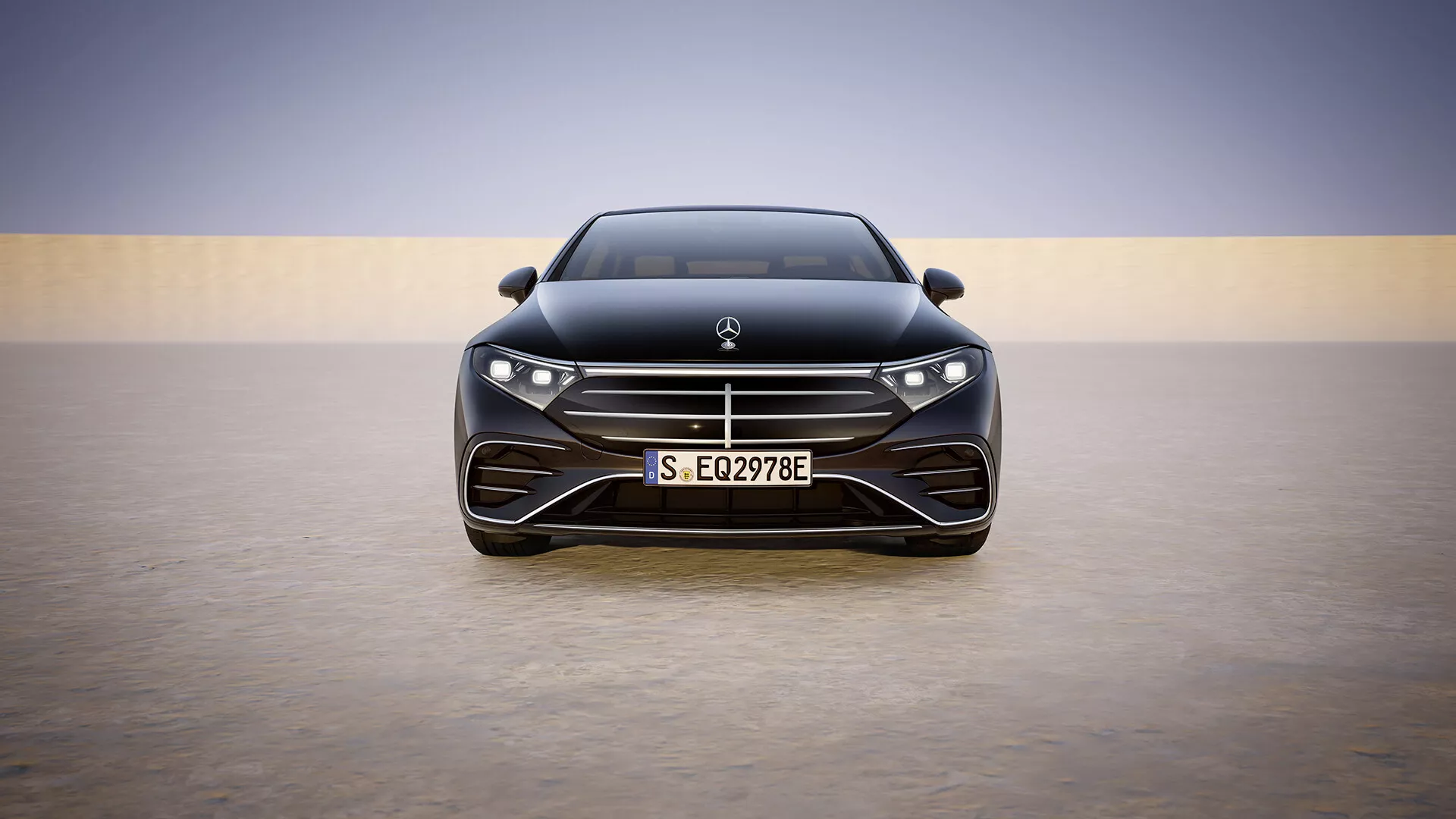 2024 Mercedes-Benz EQS facelift model presenting a striking full frontal view showcasing its sleek hood, prominent grille with horizontal slats, advanced LED headlights, and performance-oriented lower air intake, against a simplistic gradient backdrop highlighting luxury and modern technology.