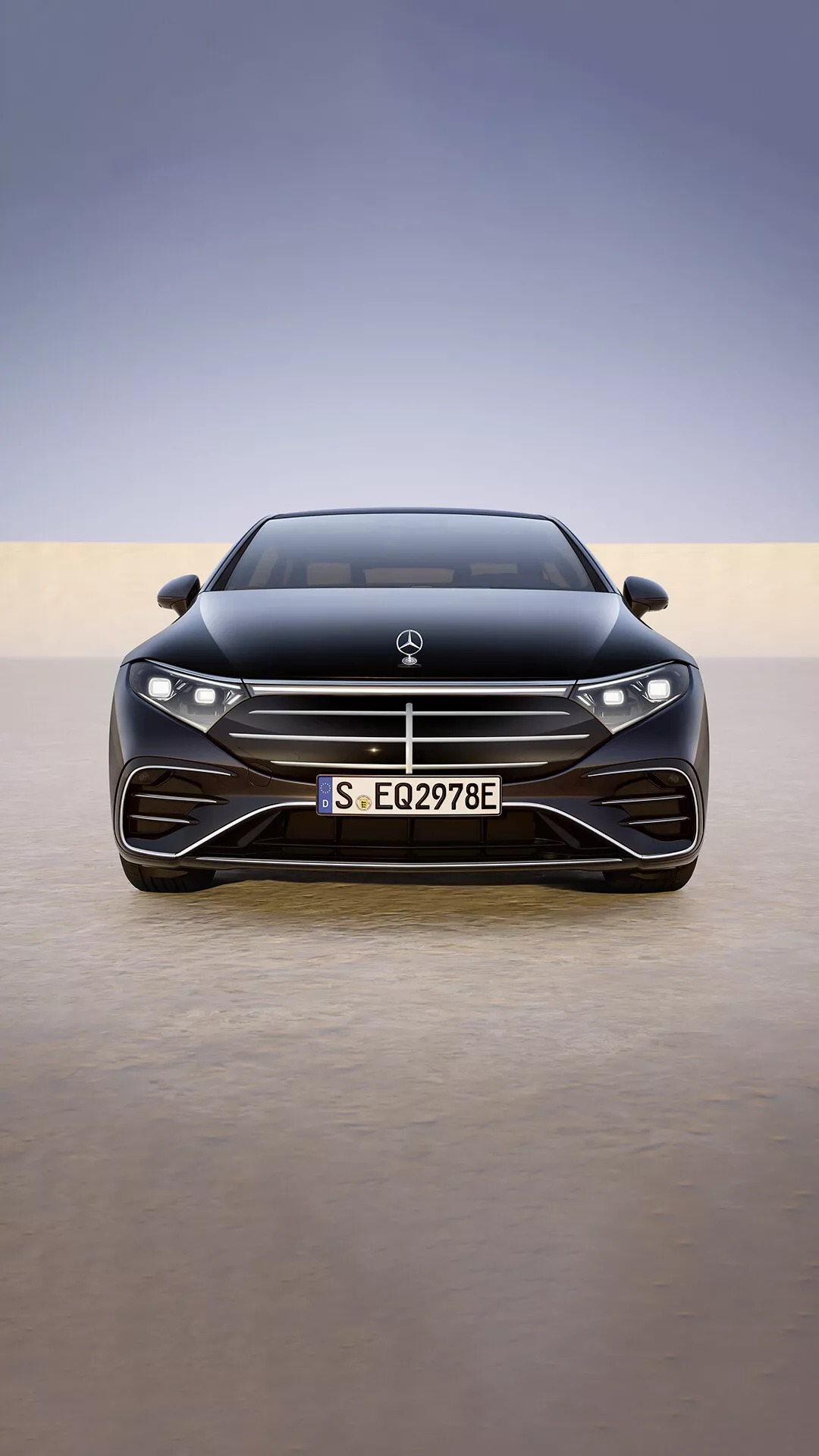 2024 Mercedes-Benz EQS 297 Facelift featuring the front grille and bumper with horizontally oriented DRLs on a polished surface with gradient background