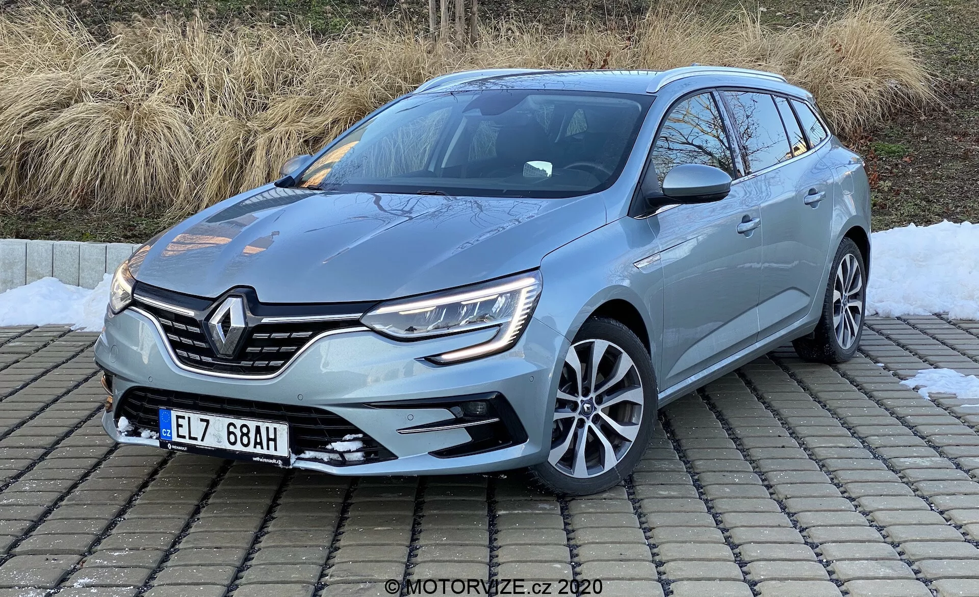 2022 Renault Megane E-Tech, a sleek electric hatchback featuring advanced technology, aerodynamic design, spacious interior, and cutting-edge safety features
