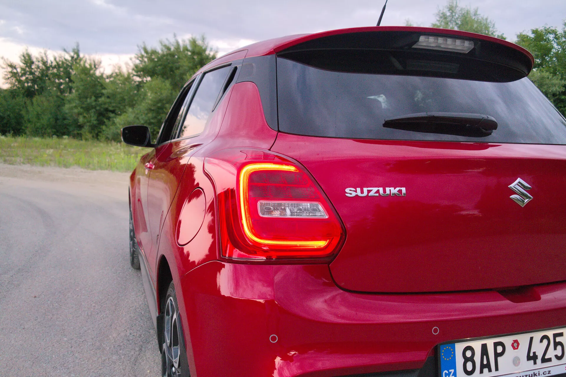 2017 Suzuki Swift Sport - A sleek, compact sporty hatchback featuring aerodynamic contours, a robust front grill, LED headlights, and dynamic alloy wheels designed for powerful performance and agile handling.